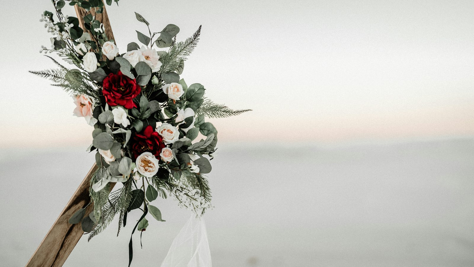 Ceremony arch with greenery
